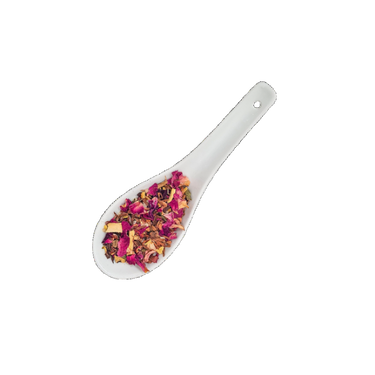 Hemp Digestive Tea with rose petals in a ceramic spoon promoting gut health.